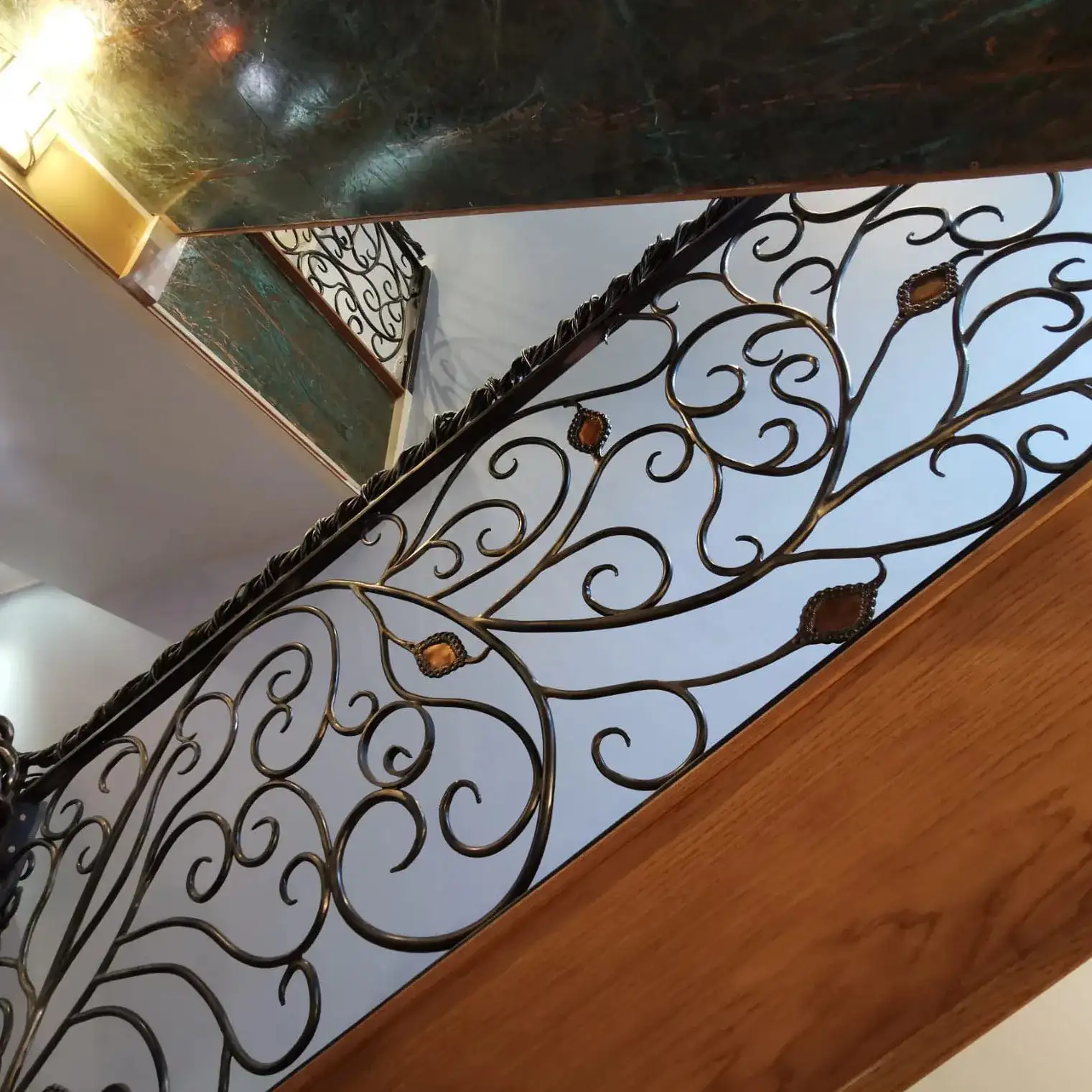 a close up of a metal stair railing
